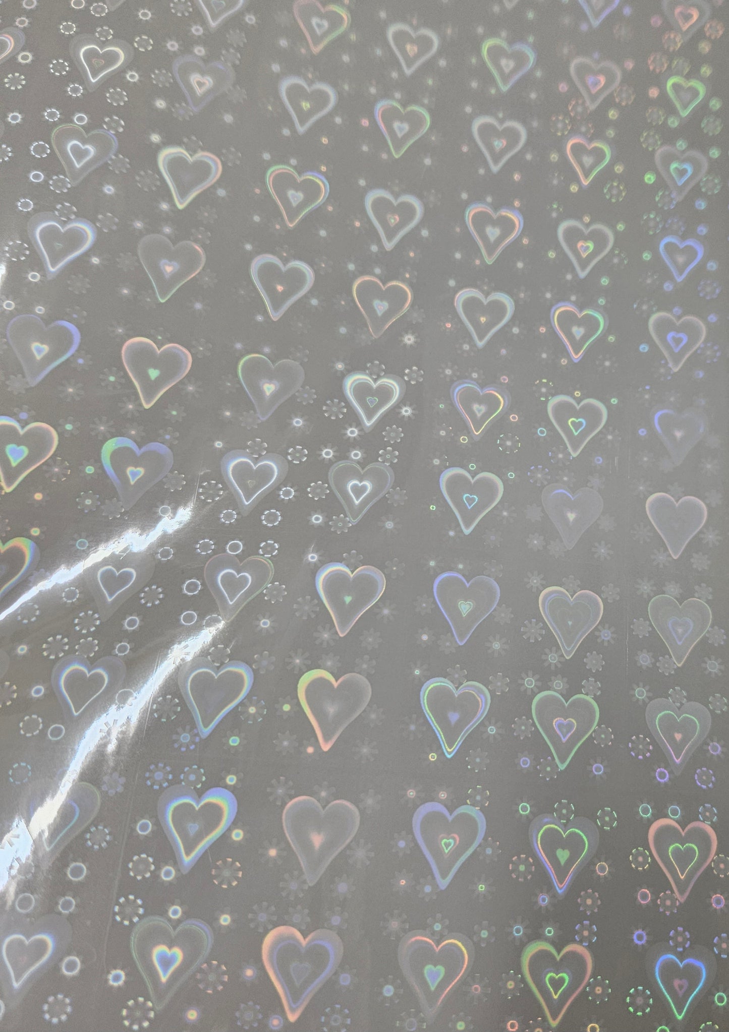 Transparent Very Sparkly Holographic Vinyl A4 Sheets Perfect for layering over stickers.