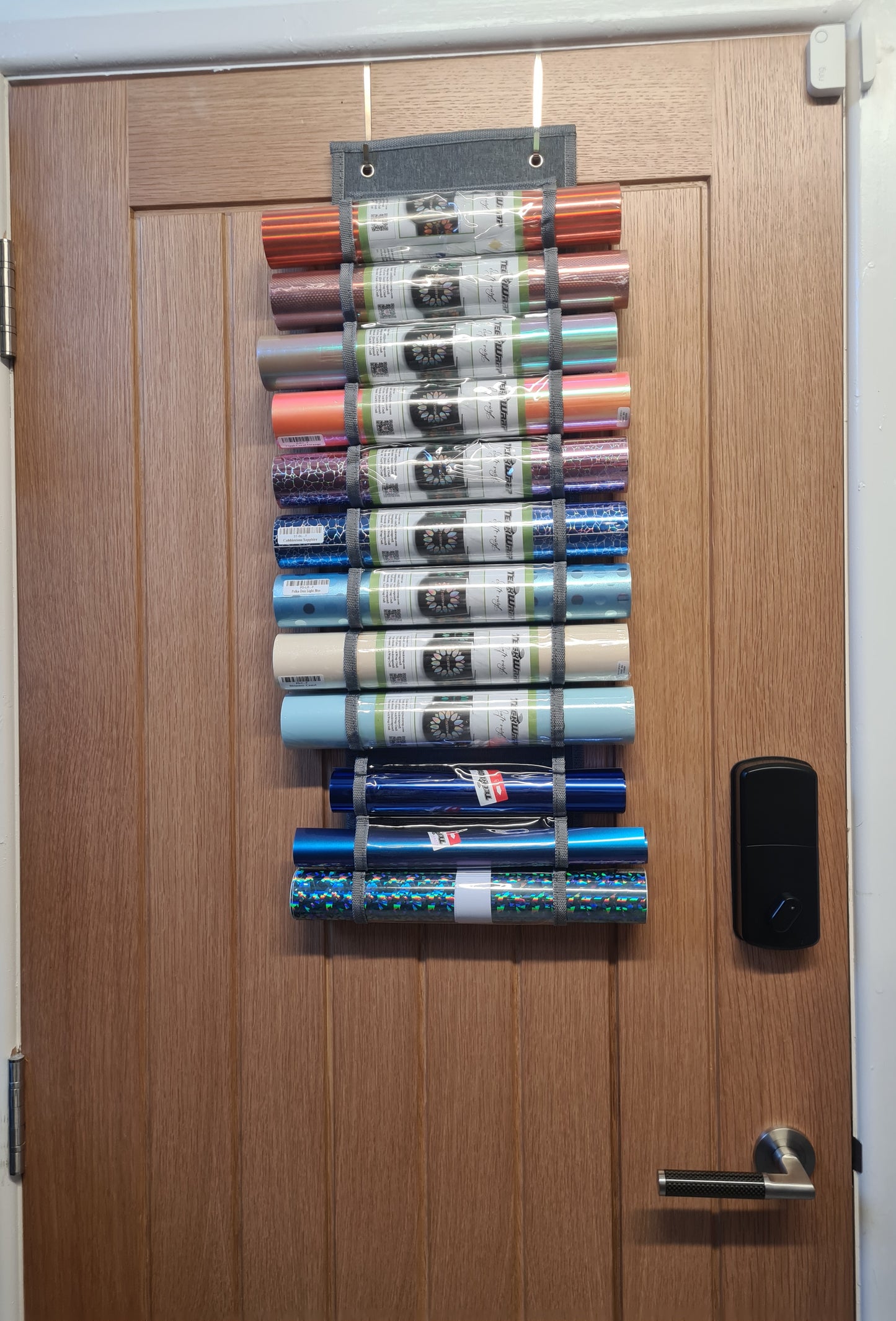 Storage racks for Rolls 48  Vinyl/ HTV roll holders, wall or door mounted.